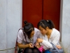 chatting-in-front-of-red-door-1